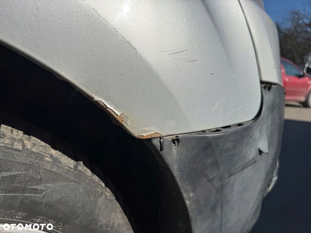 PEUGEOT PARTNER II BŁOTNIK PRAWY PRZÓD PRZEDNI EZR - 10