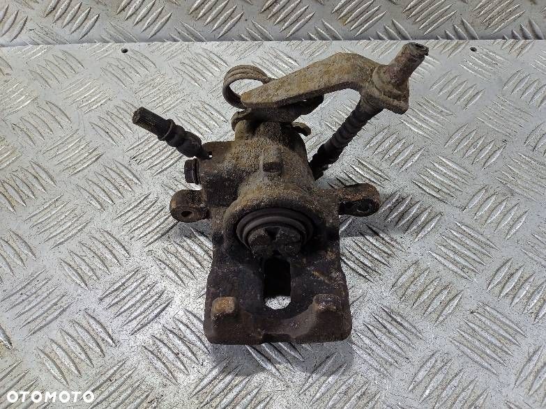 ZACISK PRAWY TYLNY HONDA CIVIC - 1