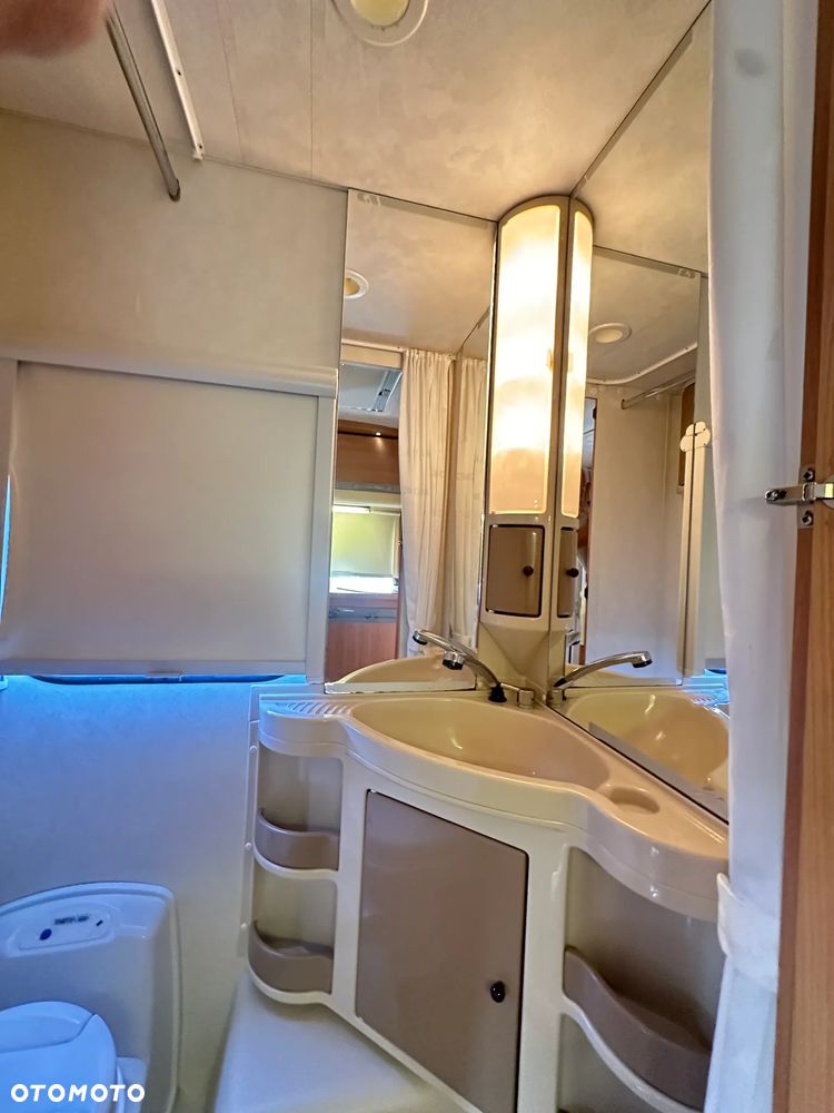 Adria ADORA 472 LU z napędem i markizą ze ścianami.  DMC 1300 - 22