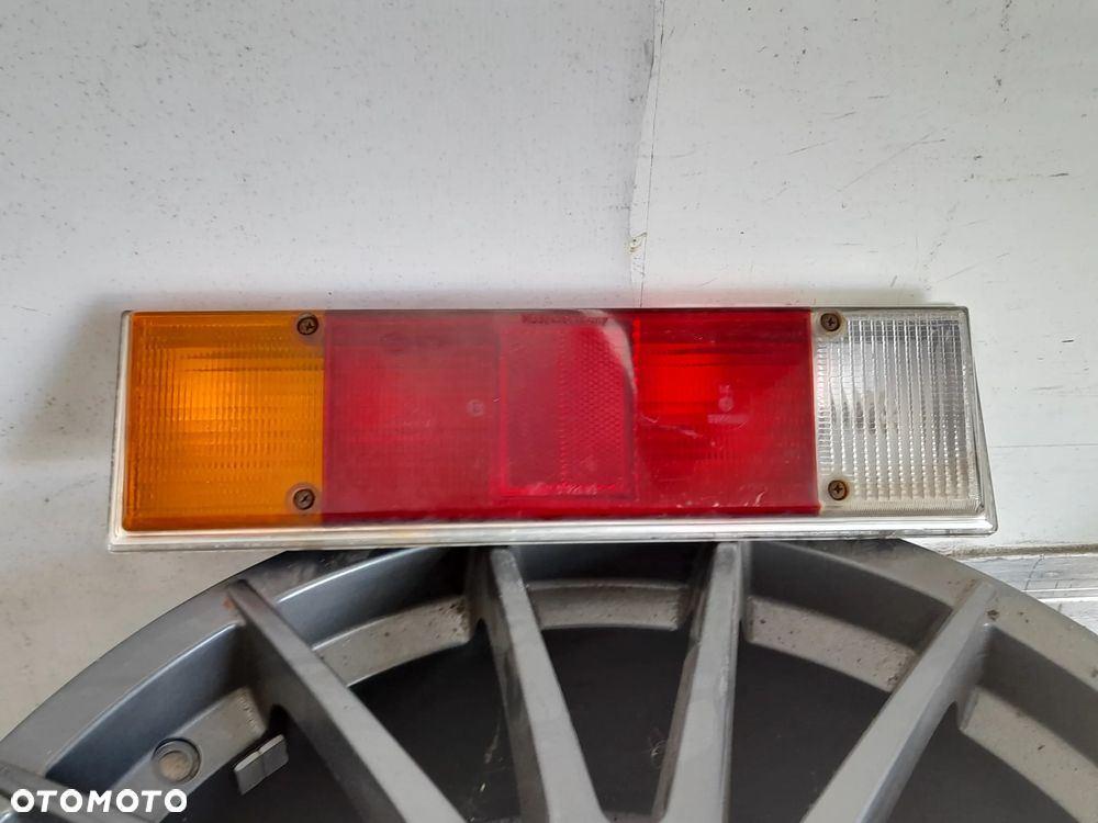 Lampa lewy tył Ford Capri MK2 Hella 74EG13435DA - 1