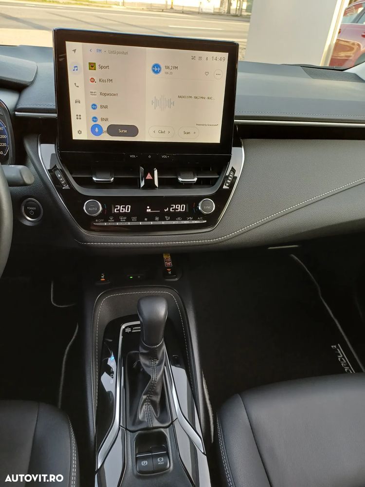 Toyota Corolla TS 1.8 HSD Exclusive - 14