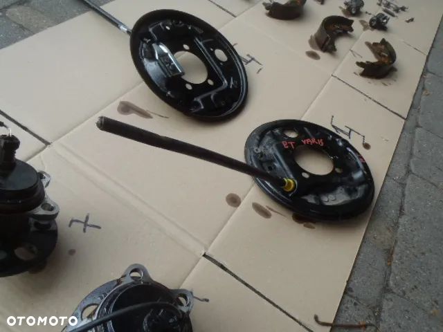 bęben szczęki cylinderek rozpierak hamulec tylny osłona tarcza kotwiczna kostka abs z zawieszenie tył toyota yaris II III 2 3 jak nowe - 27