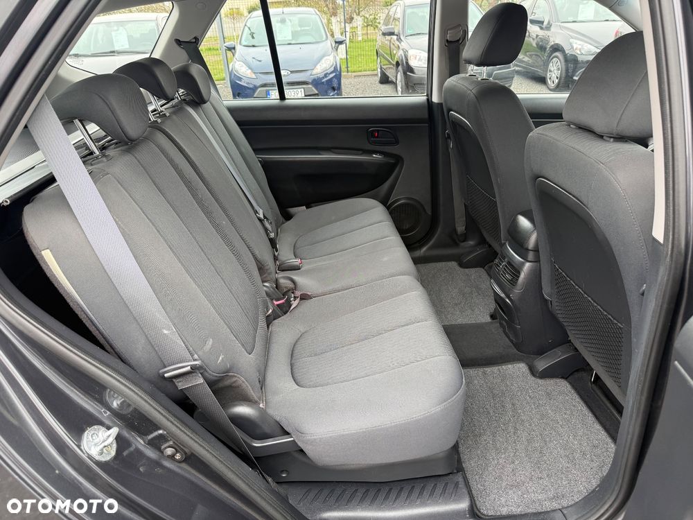 Kia Carens 2.0 CVVT EX - 13