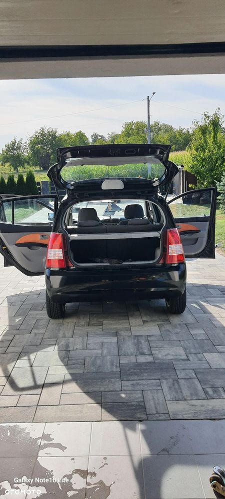 Kia Picanto 1.1 Optimum + - 7