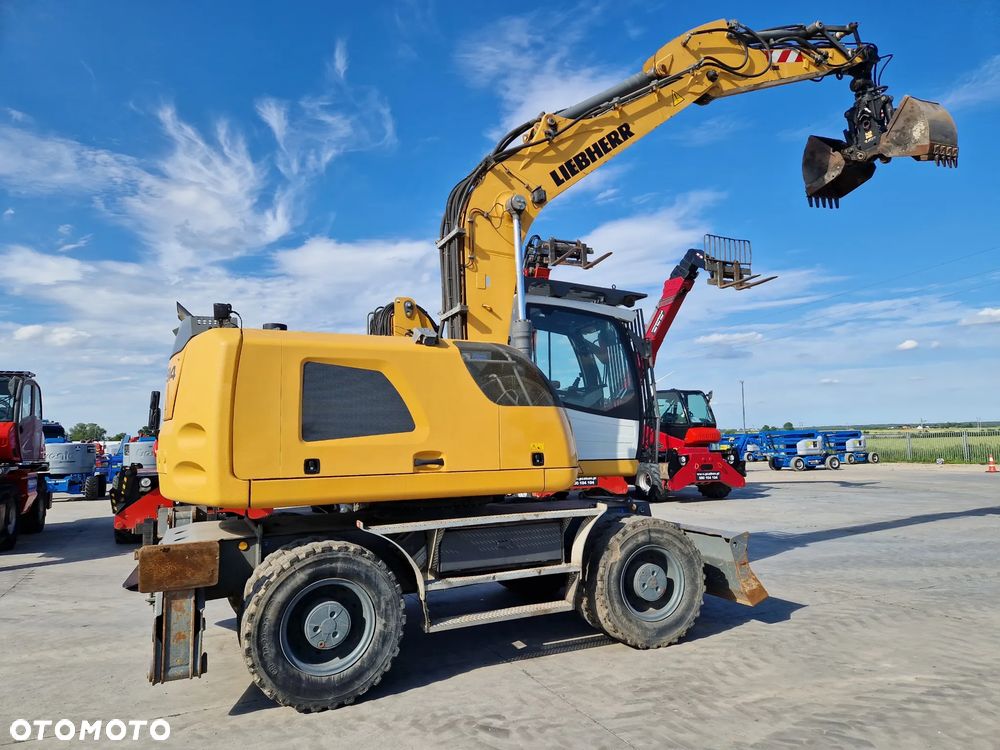 Liebherr A 914 Litronic jak TEREX CAT SENNEBOGEN M497 - 24