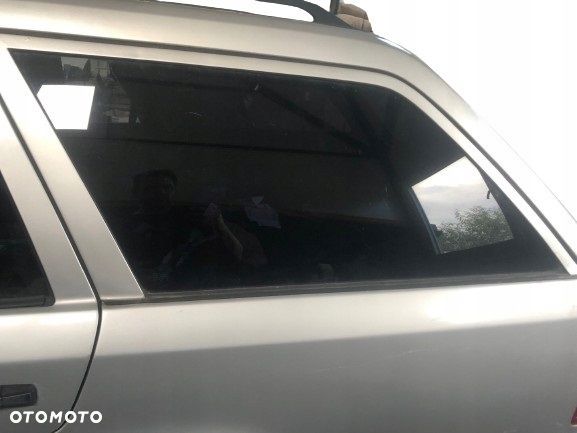 MERCEDES E KLASA W124 250D 84-93 SZYBA KAROSERYJNA TYŁ LEWA KOMBI 5D - 1