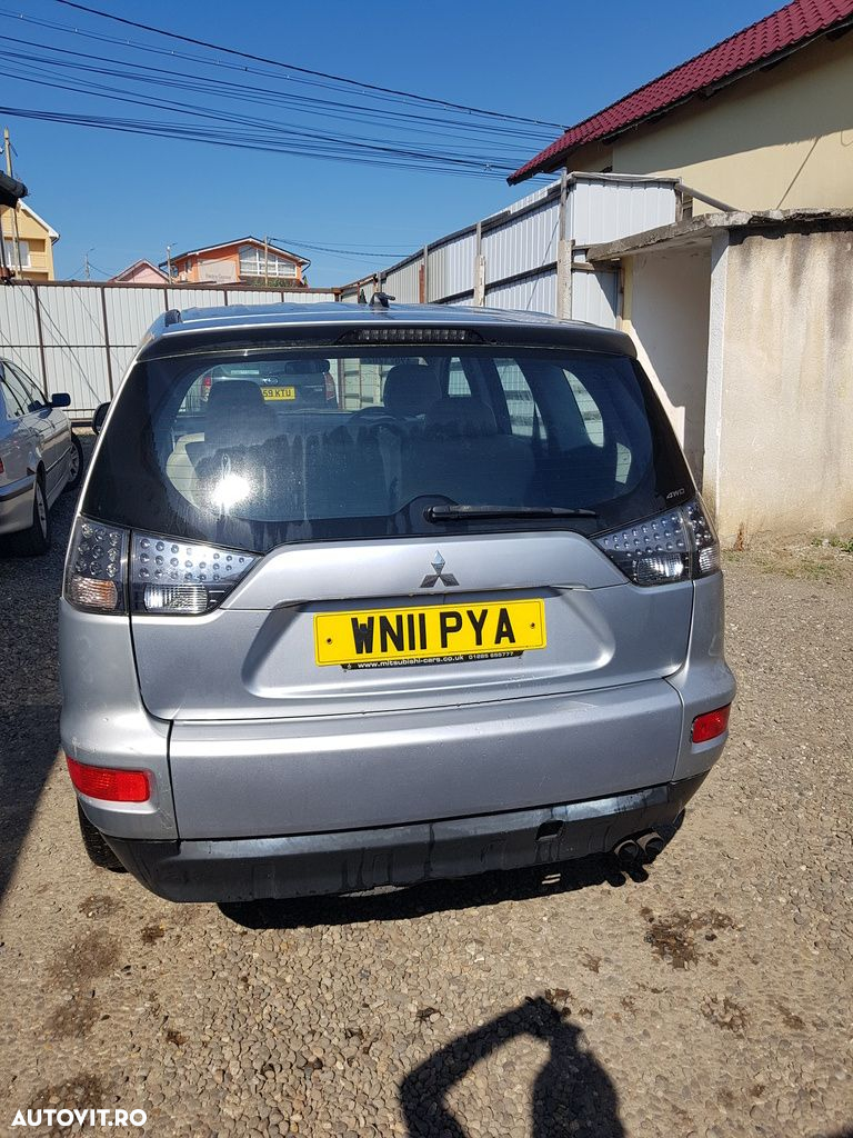Bara spate Mitsubishi Outlander Facelift 2009 - 2012 SUV 5 Usi ARGINTIU (561) Colt stanga - 2