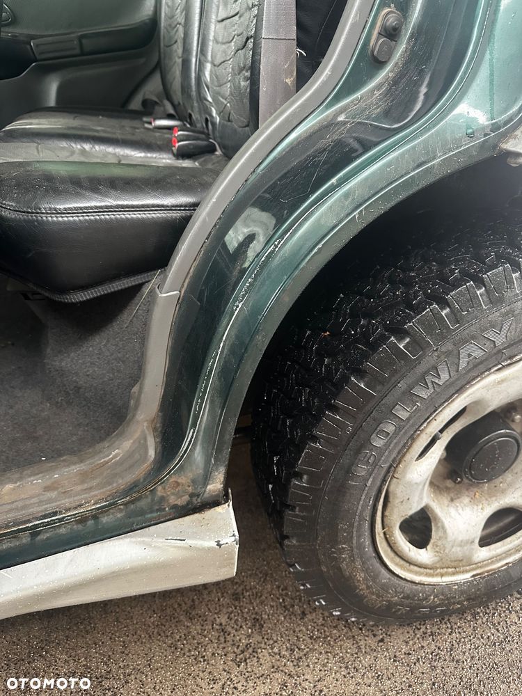 Suzuki Grand Vitara 2.0 - 10