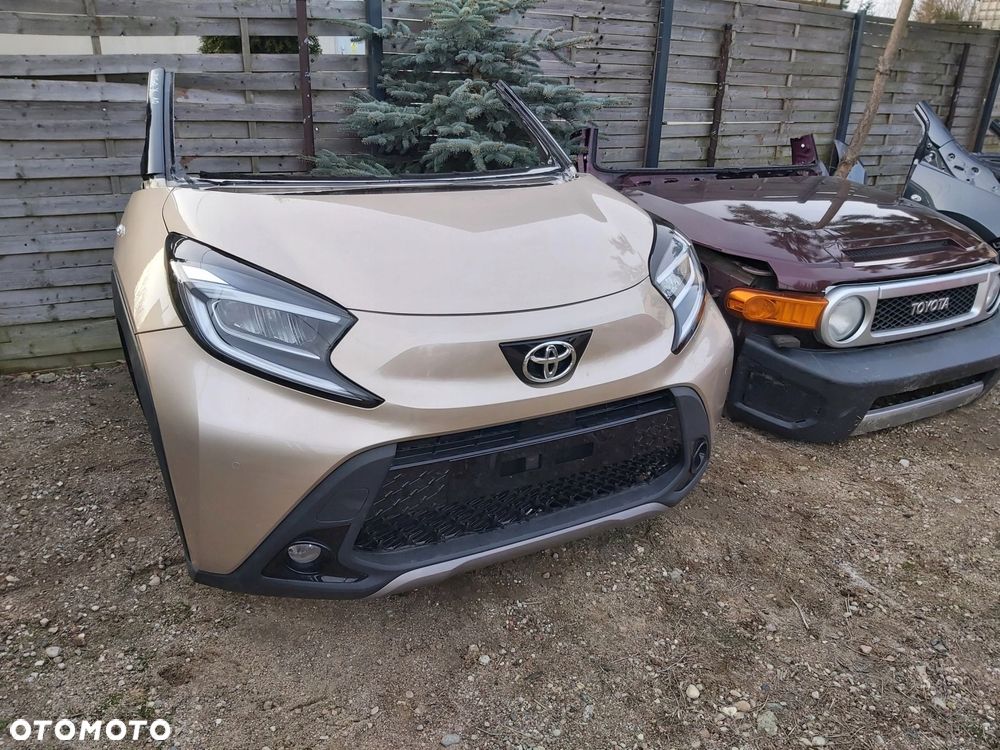 Toyota AYGO X CROSS boczek bagażnika prawy tył 64730-0H030 - 5