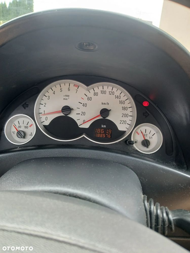 Opel Corsa 1.2 16V Cosmo - 6