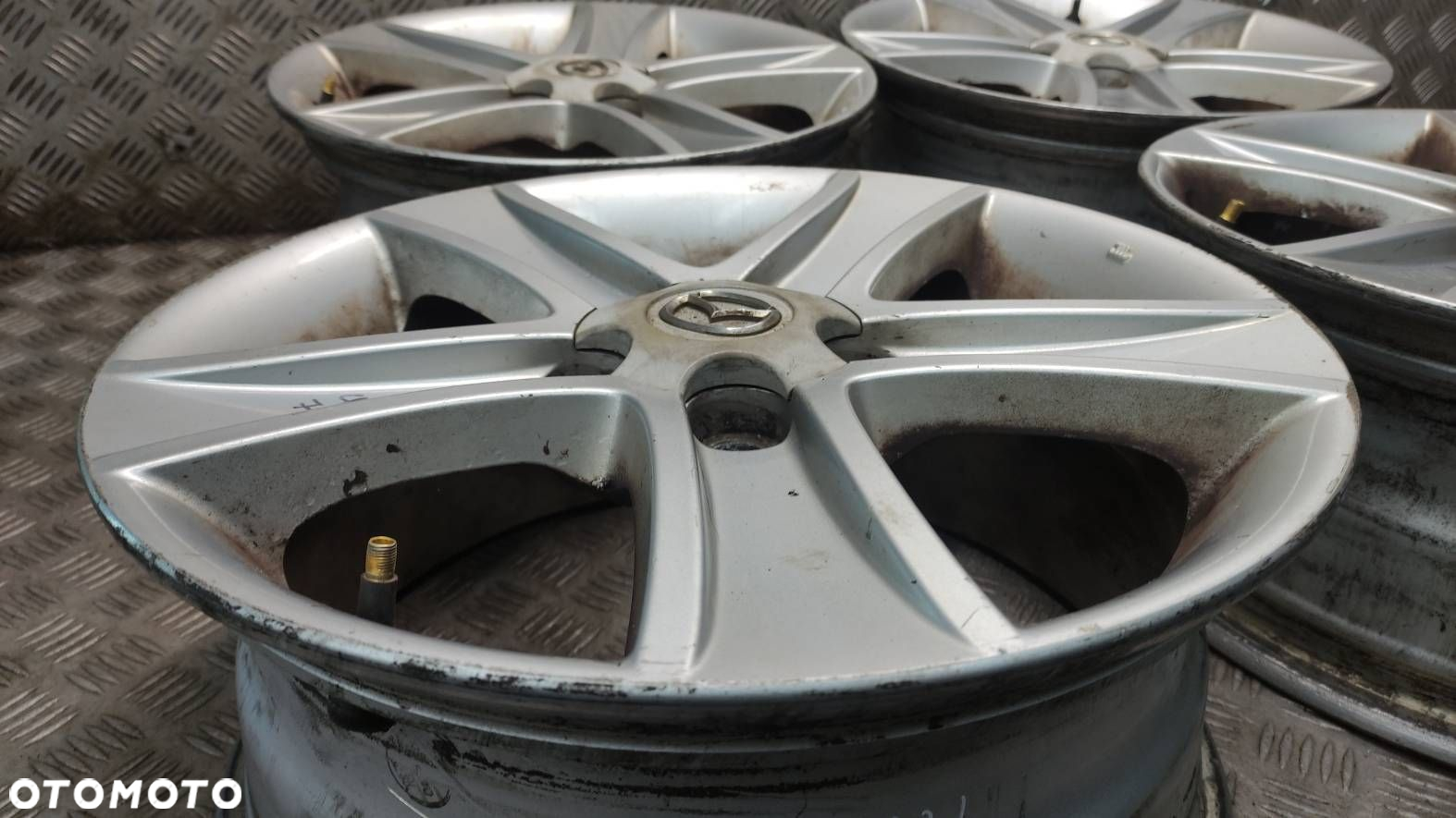 FELGA ALUMINIOWA 4 SZT MAZDA 16X7J ET55 5X114,3 - 12