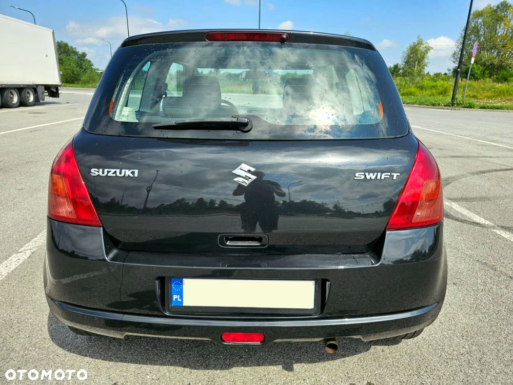 Suzuki Swift 1.3 Comfort - 31