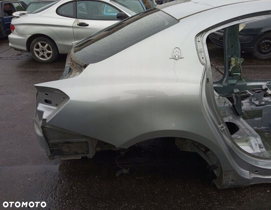 ĆWIARTKA BŁOTNIK PRAWY TYLNY MASERATI GHIBLI III - 1
