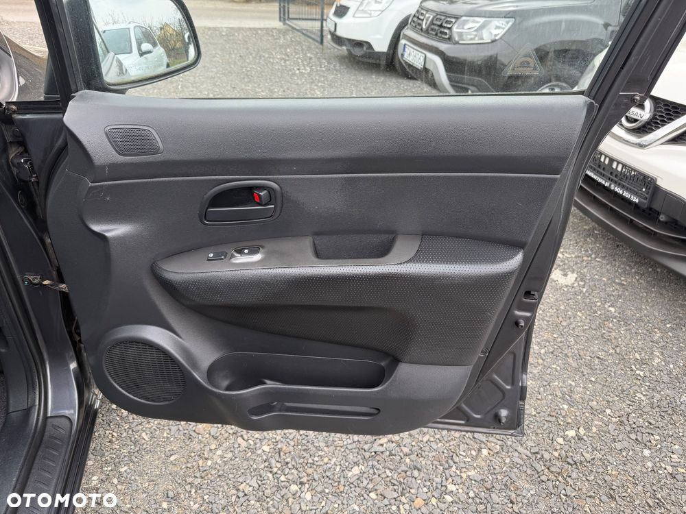 Kia Carens 2.0 CVVT EX - 12