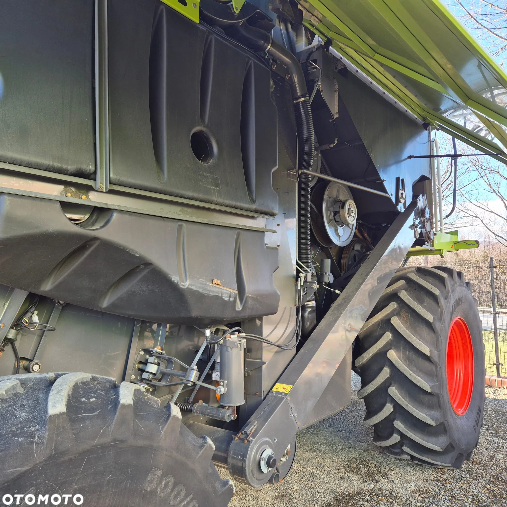 Claas Lexion 650 z hederem - 21