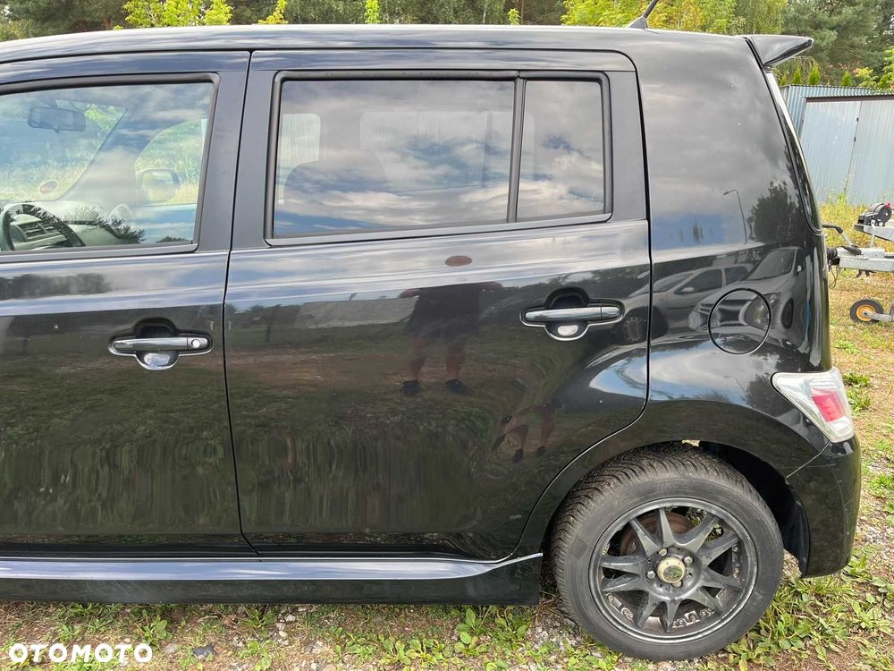 drzwi tył tylne tylnie lewe daihatsu materia x07 czarne 2006 - 2011