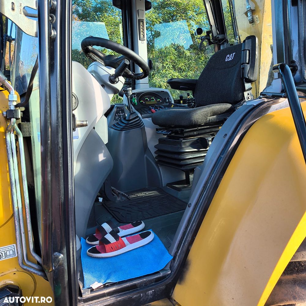Cat 428F - 9