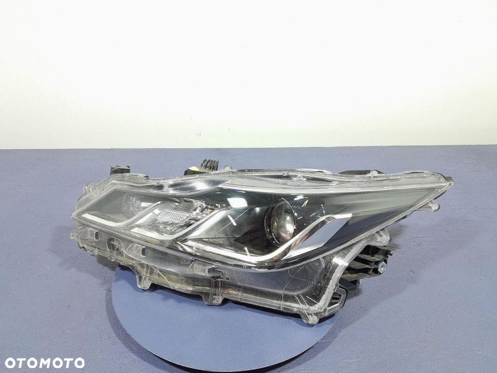TOYOTA COROLLA XII E21 LIFT REFLEKTOR LEWY PRZÓD LED SOCZEWKA 81150-02T31 - 2