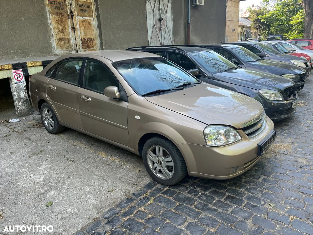 Dezmembrez Chevrolet Lacetti benzina bej auriu 2006 - 1