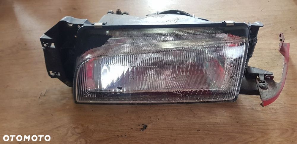 MAZDA 323 IV 3 DRZWI LAMPA PRZÓD LEWA - 1