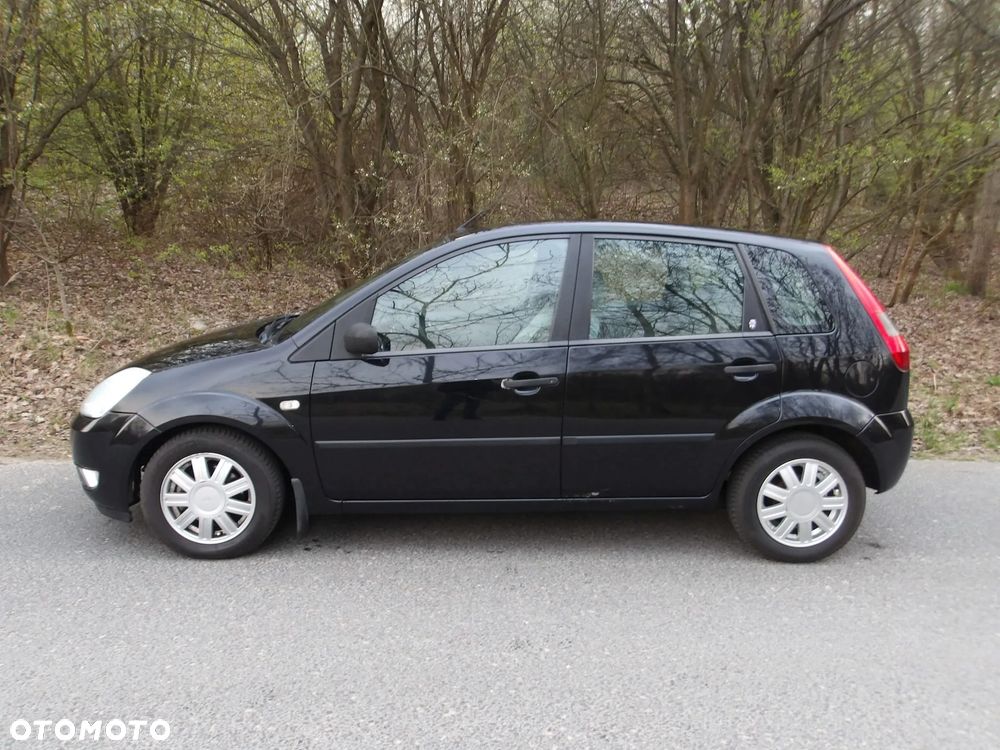Ford Fiesta 1.4 Ghia - 4