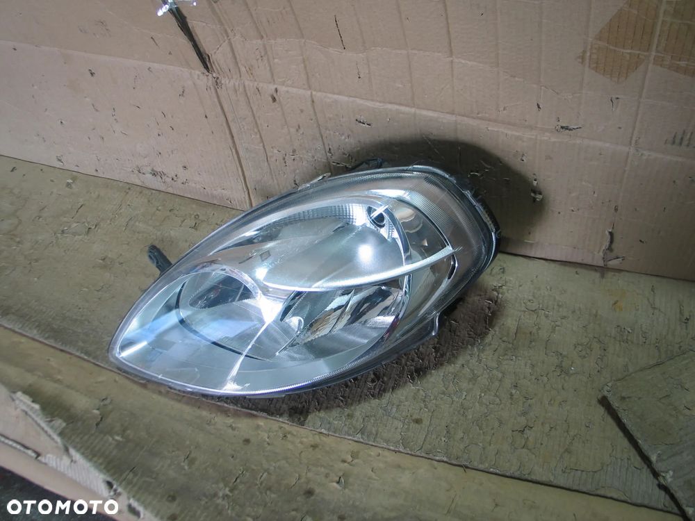 lampa przod lancia ypsilon 2 II lift 06-11r. oryginal europa - 7