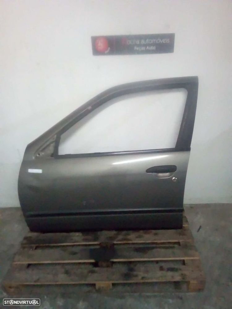 Elevador Frente Esq Nissan Primera (P11) - 1