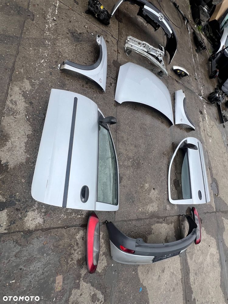 Zderzak przedni Corsa  drzwi prawe lewe przód tył lampy przednie tylne - 5