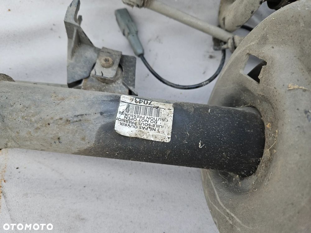 Amortyzator sprezyna McPherson lewy przód Peugeot 3008 I 1,6 THP 2011r 70 tys. km 7043 - 4