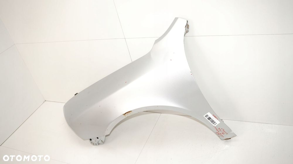 BŁOTNIK LEWY PRZÓD SKODA OCTAVIA II LIFT 08-13R LA7W - 14