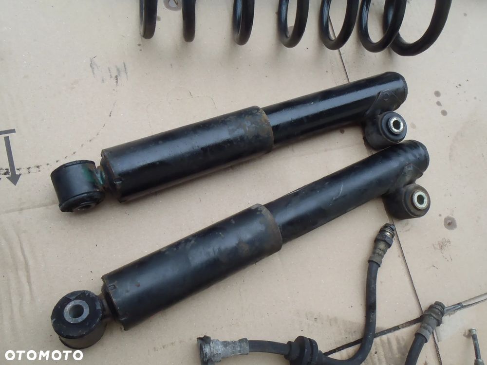 sprężyna sprężyny amortyzator tył tylne fiat panda II seicento cinquecento punto I II lift orginał - 3