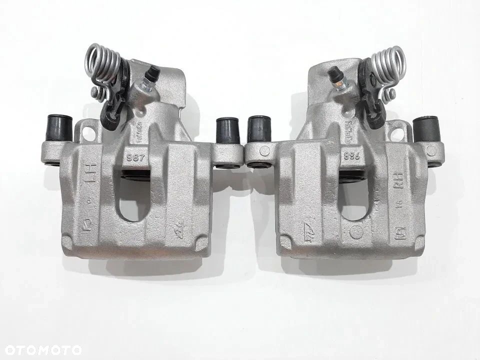 Zacisk tył Lewy Prawy Volvo v50 S40 II C30 C 70 II Ford Focus I II C-Max Mazda 3 - 1