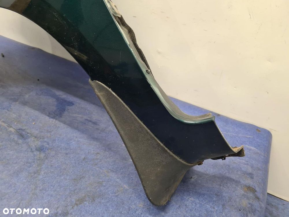 TOYOTA YARIS II LIFT BŁOTNIK PRZÓD LEWY 6S3 - 6