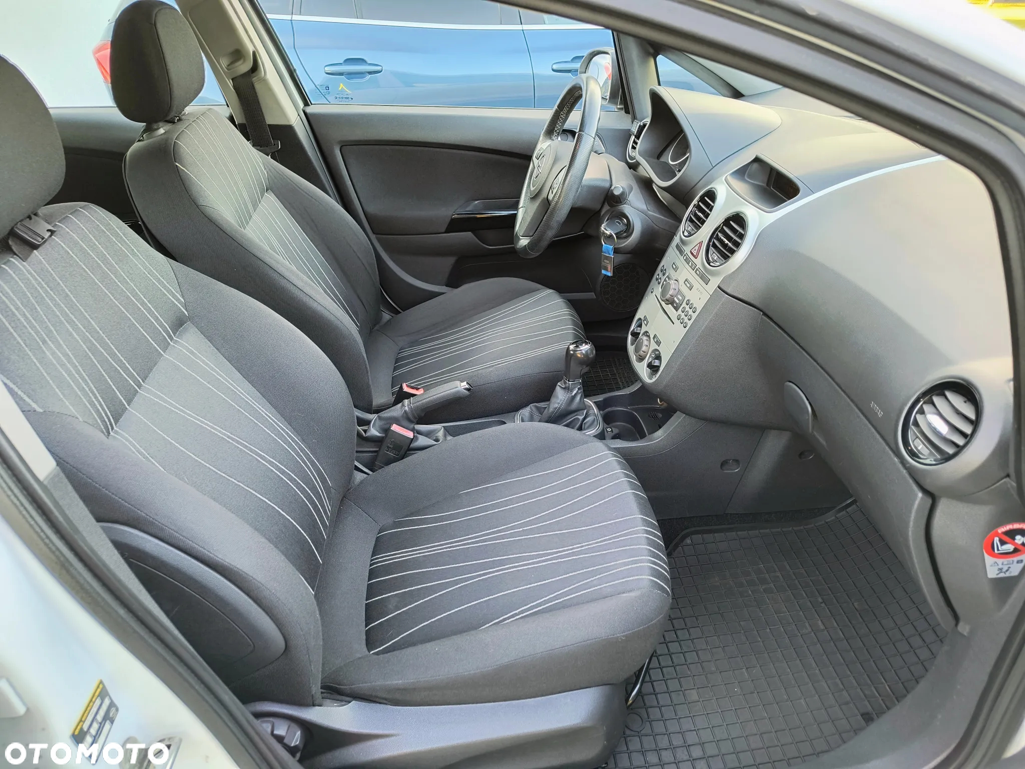 Opel Corsa 1.4 16V Enjoy - 12