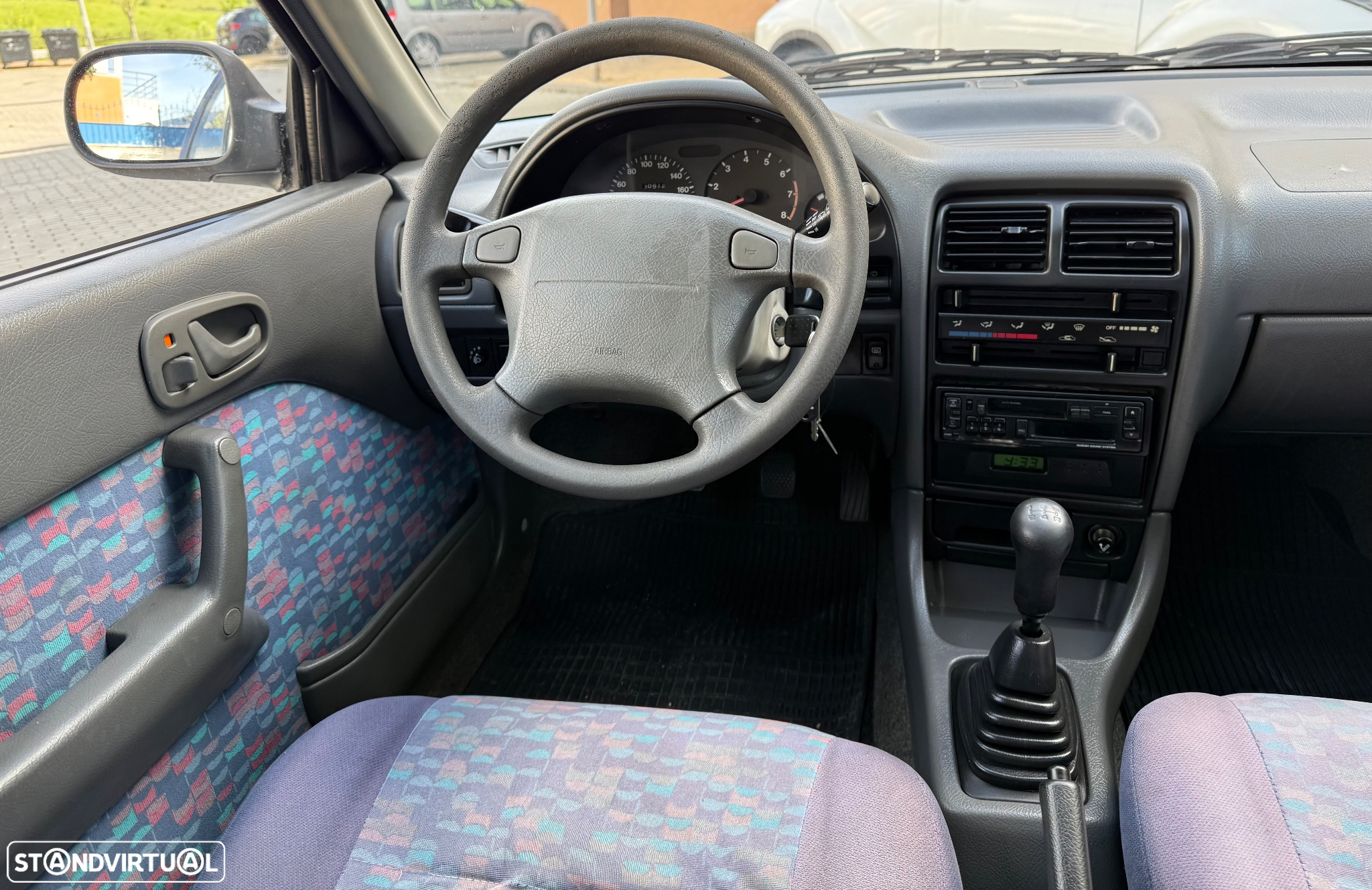 Suzuki Swift 1.0 GLX DA - 16