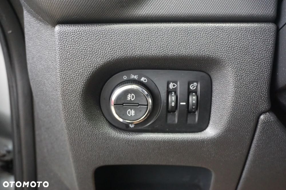 Opel Corsa 1.2 16V Enjoy - 23