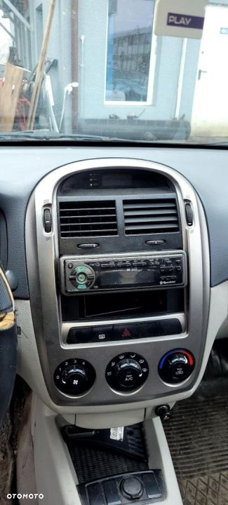 RAMKA RADIA KIA CERATO PANEL 2006 - 1