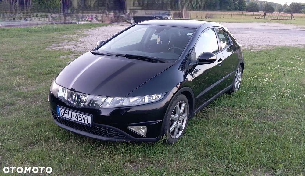 Honda Civic 1.8 Comfort - 14