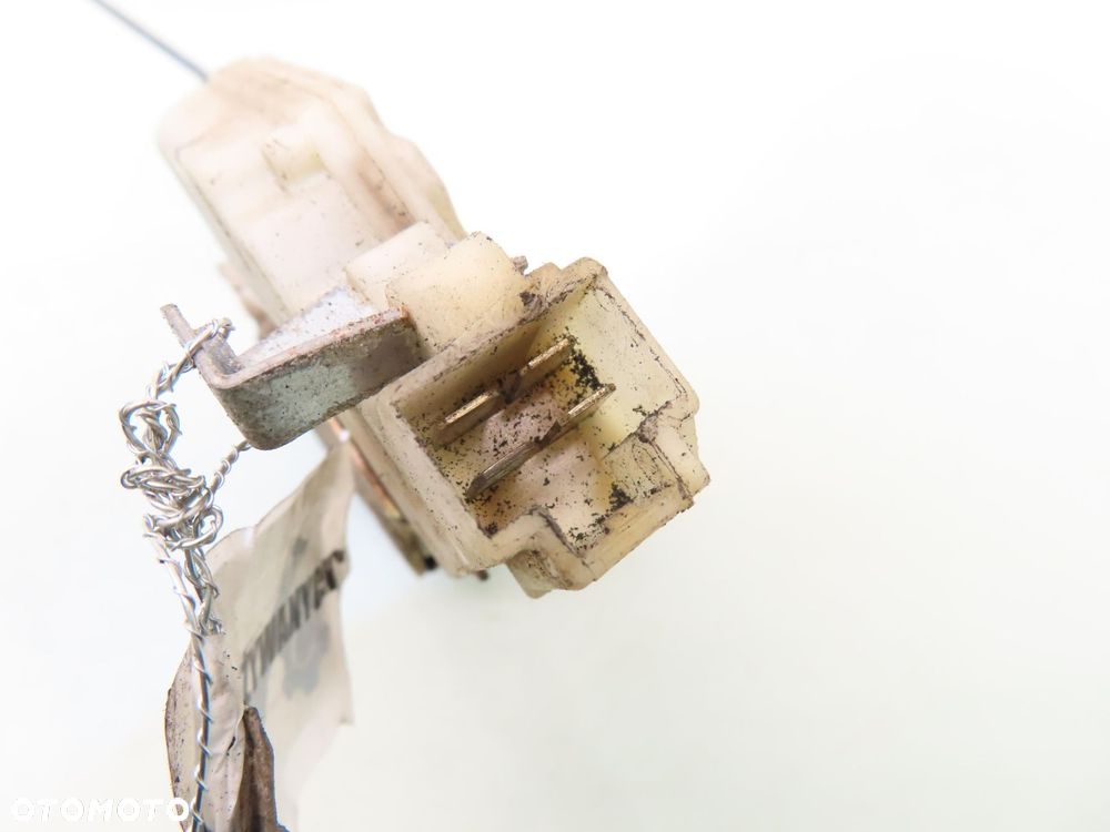 ZAMEK LEWY PRZEDNI NISSAN TERRANO II (R20) 89A531 4 PIN - 2
