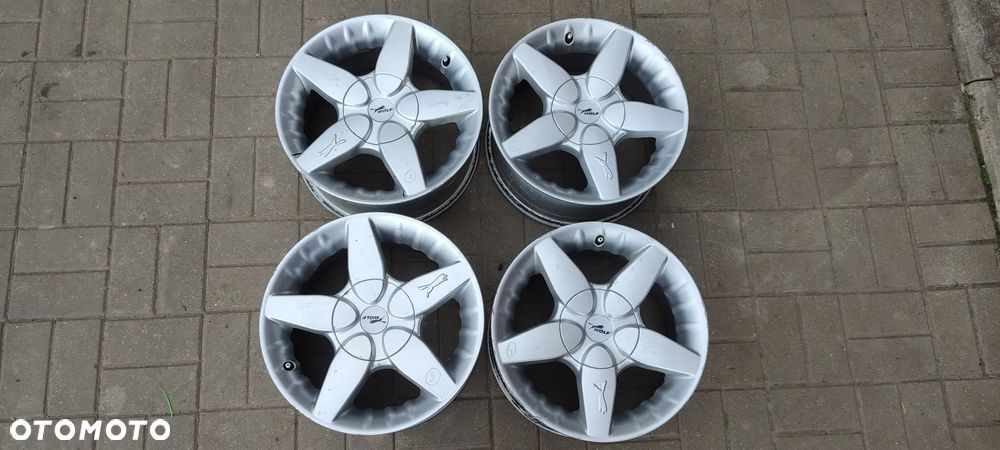 FELGI ALUMNIOWE WOLF 4x108 7Jx15 CALI ET40 INTRA fi 63,3 FORD ESCORT SIERA FOCUS FIESTA KOMPLET 4 SZTUKI - 1