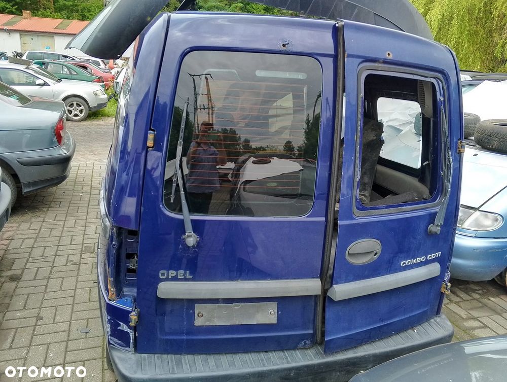 Opel Combo C (03-11r.) 1.3D 69KM. Silnik Y13DT Skrzynia M26 lakier 4DU. Cały na części GWARANCJA!!!!  Przód Tył Zestaw Komplet Drzwi Klapa Zderzak Błotnik Maska Grill Atrapa Szyba Pas Lampa Lusterko Boczki Fotel Kanapa Kokpit Deska Rozdzielcza Przełącznik Włącznik Sterownik Przewody Wiązka Instalacja Moduł Komputer Czujnik Listwa Pompa Alternator Wtryski Głowica Rozrusznik Kompresor Sprzęgło Dwumas Silnik Skrzynia ABS Klimatyzacji Paliwa Wspomagania Kolektor Turbina Przepustnica Zawór Chłodnica Koło Hak Belka Sanki Zawieszenie Mcpherson Półoś Amortyzator Wydech Tłumik Zacisk Most - 4