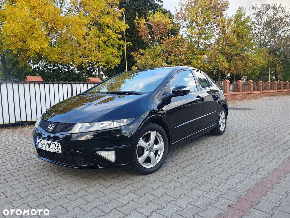 Honda Civic 1.4 i-VTEC Comfort Black Edition - 1