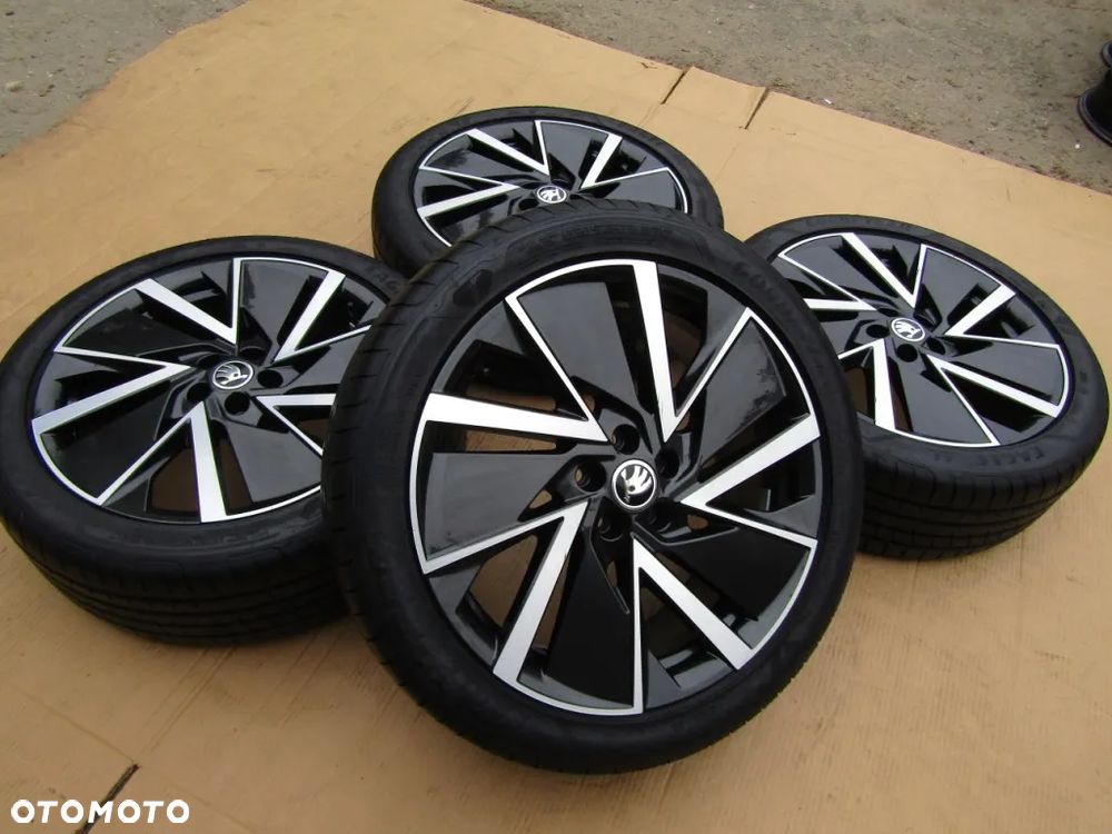 4x Felgi 18 Skoda Scala Fabia Kamiq VW T-CROSS Polo V VI Taigo Seat Arona Ibiza IV 7 j 5x100 ET39 - 12