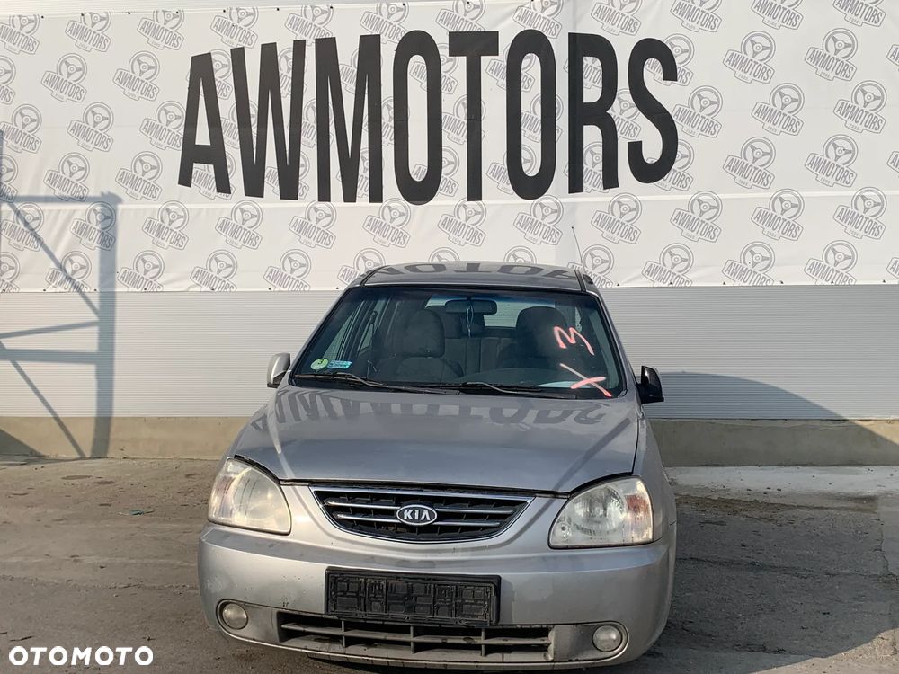 KIA CARENS 2004 *SAMOCHÓD NA CZĘŚCI* 1947 MASKA, LAMPA, DRZWI, LUSTERKO, ZDERZAK, GRILL, BŁOTNIK, KLAPA, BELKA, DESKA, FOTELE, KANAPA, ĆWIARTKA, KIEROWNICA, TARCZE, ZACISKI, ZAWIESZENIE, KOMPLETNY PRZÓD, KOMPLETNY TYŁ, LICZNIK, ZEGARY, PRAWE LEWE PRZÓD TYŁ - 4