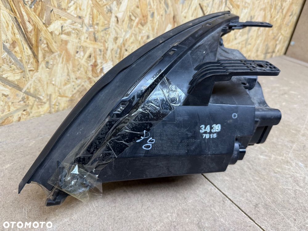 LAMPA PRAWA XENON OPEL ANTARA LIFT - 8