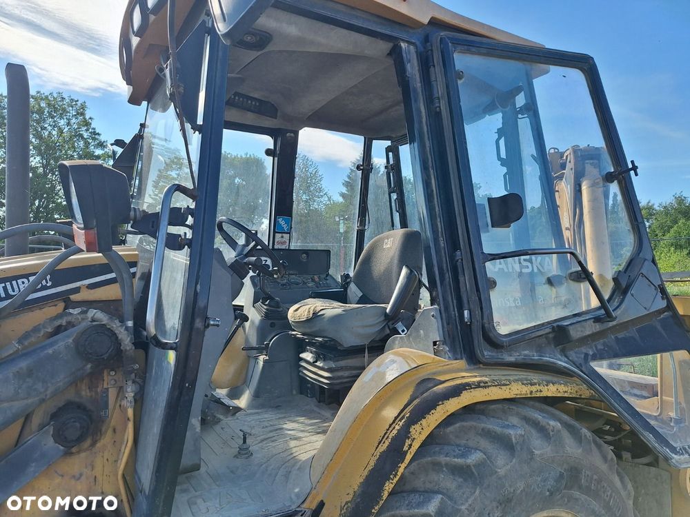 Caterpillar 428 C 4X4 - 8