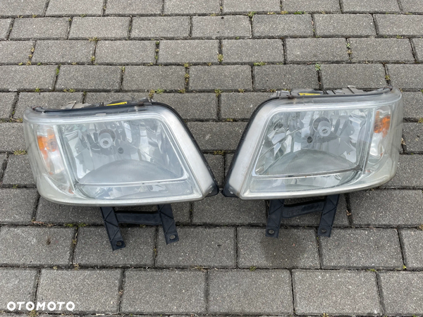 VW T5 lampa reflektor przód lewy prawy oryginał EUROPA