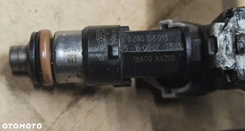 Nissan Note E11 1.4 16V wtryskiwacz listwa wtryskowa 16600-AX20B CR14 - 2