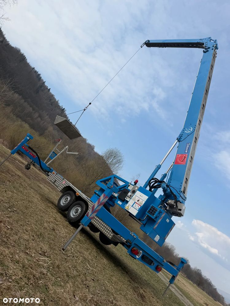 KLAAS K21/31TSR Dźwig Dekarski żuraw zwyżka podnośnik 31m. udźwig 1800kg max. Silnik Yanmar 3cyl. Kosz pojemnik. Dźwig Sterowany całkowicie zdalnie z pilota. Do 3,5 tony Transportowanie samochodem osobowym! Podwieszana oś Hydr. Własny Napęd Hydr. na 2 koła w terenie. Maszyna jak Nowa 2 tyś mtg. 2015r. Po serwisach Dekra. Sprowadzona z Norwegii. Nie różni się od nowej z salonu. Pełna Hydraulika w maszynie. Najbogatsza wersja. OKAZJA  230volt. Zero zużycia! - 37