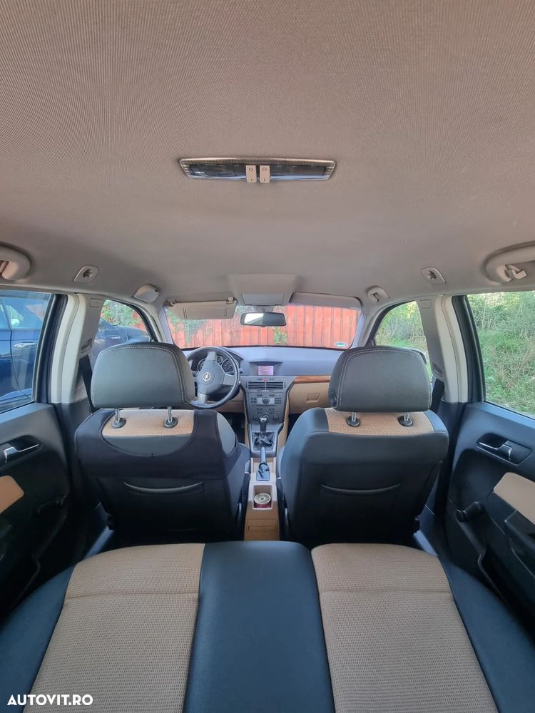 Opel Astra 1.9 CDTI Caravan Cosmo - 1